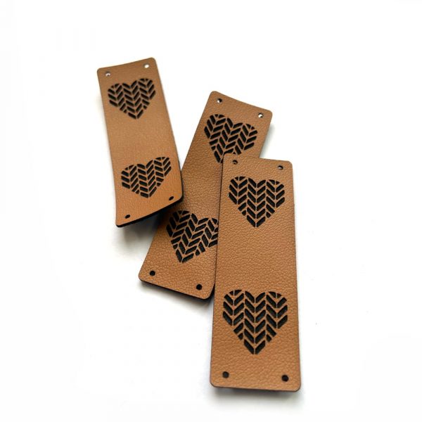 Heart graphic brim fold leather tags